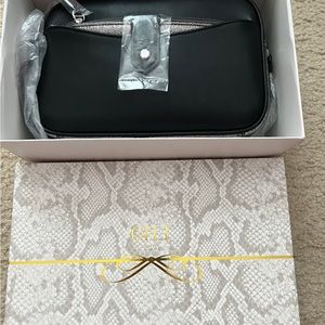 GILI Leather Crossbody Purse
With Wallet
Brand New
Genuine Leather